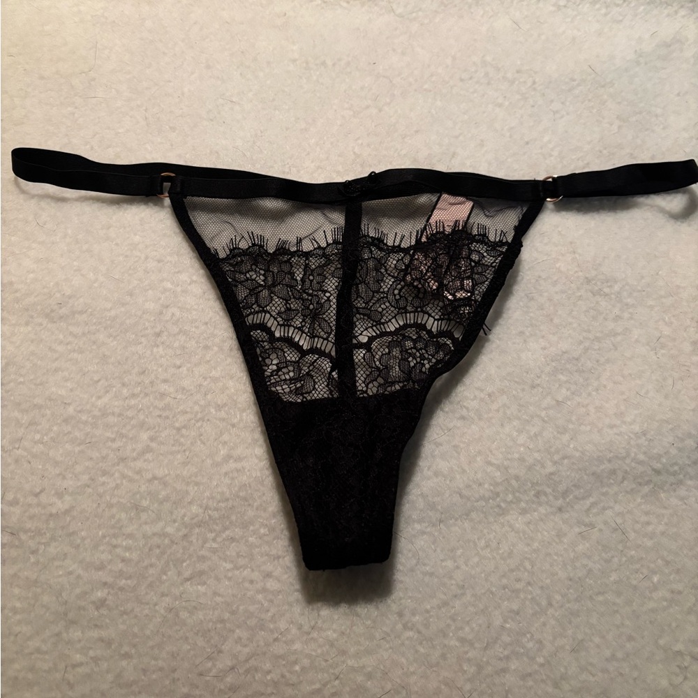 Victoria’s Secret v-string panty, size medium.